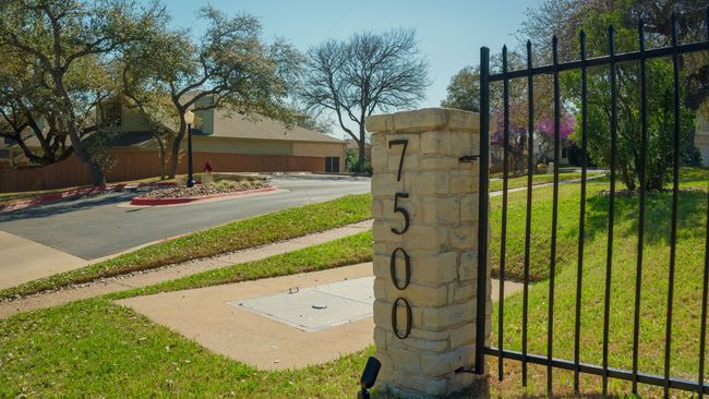 View of gate with a yard | Image 4
