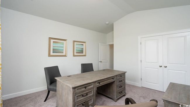 Office area featuring light colored carpet, baseboards, and vaulted ceiling | Image 28