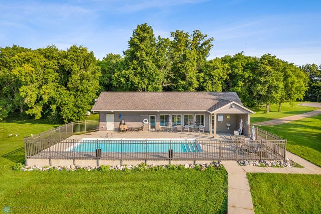 Relax or entertain at the clubhouse with heated pool | Image 9