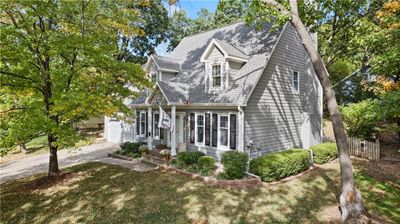 View of front facade with a front lawn | Image 2