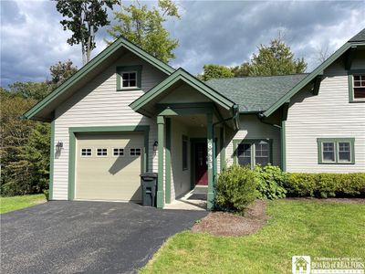 8433 - 8433 Canterbury Drive, Condo with 5 bedrooms, 5 bathrooms and null parking in French Creek NY | Image 2