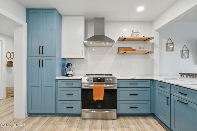 Kitchen view from the sink/refrigerator side | Image 10