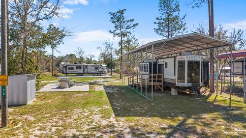 910 Bird Pond Rd Ne, Steinhatchee, FL, 32359-2744 | Card Image