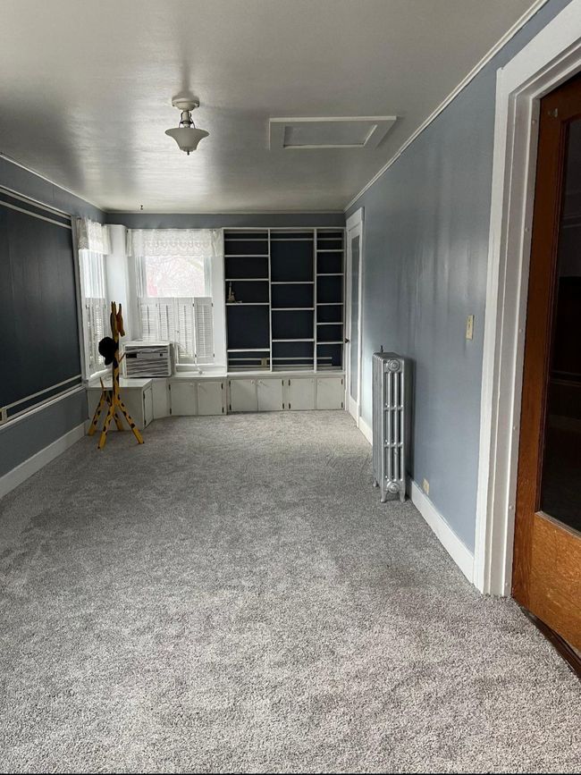 Bonus room with built in shelving & closet | Image 13