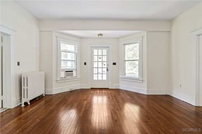 Front Door with refinished wood floors | Image 9