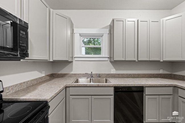 New counter tops, cabinets, flooring, & appliances | Image 12