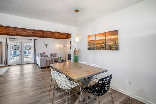 Casual dining space connects with the main living area—offering flexibility for everyday meals or gathering with friends. | Image 14