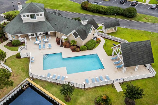 View from above of property with a pool area | Image 22