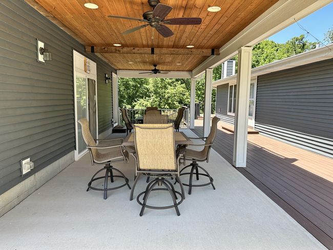 Space between the garage and house. | Image 7