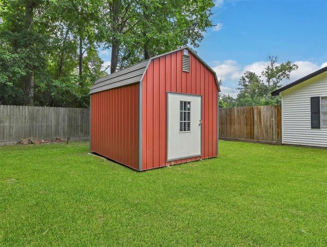 27015 Coach Light Ln, House other with 3 bedrooms, 2 bathrooms and null parking in New Caney TX | Image 25
