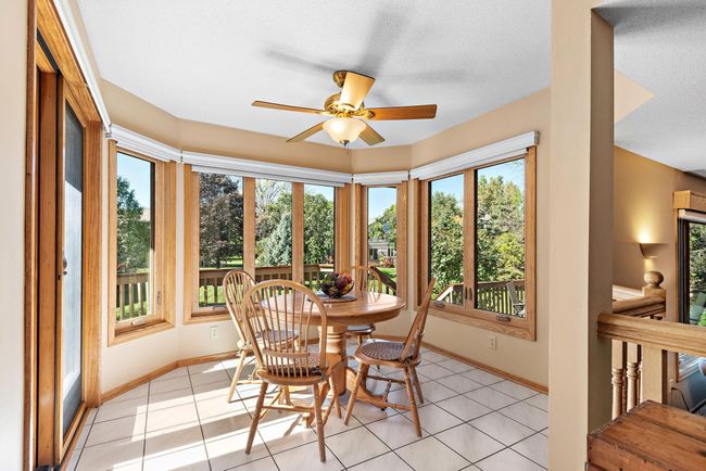 Lovely eat-in dining area with views of the backyard. | Image 11