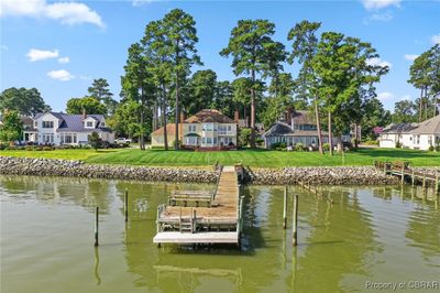 Dock area featuring a water view and a yard | Image 3