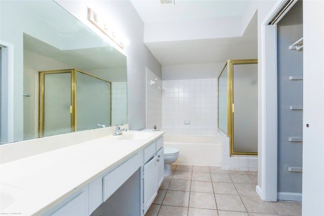 Large primary bathroom with a 2nd closet. Another closet in bedroom. | Image 14