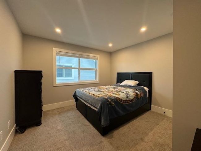 Bedroom featuring carpet, baseboards, and recessed lighting | Image 28
