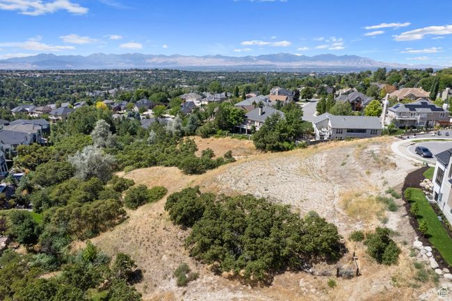 Aerial view of residential area with mountains | Image 31