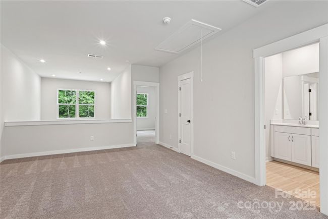 *Representative of the Norman floorplan – not the actual home* Spacious loft and second living area overlooking the stunning 2-story great room. | Image 8