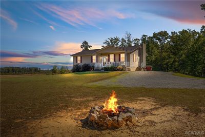 Front of house with firepit | Image 1