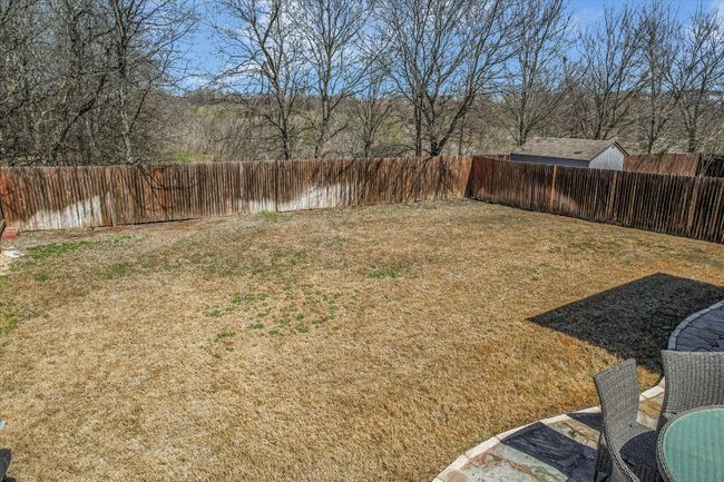 View of yard featuring a fenced backyard | Image 24