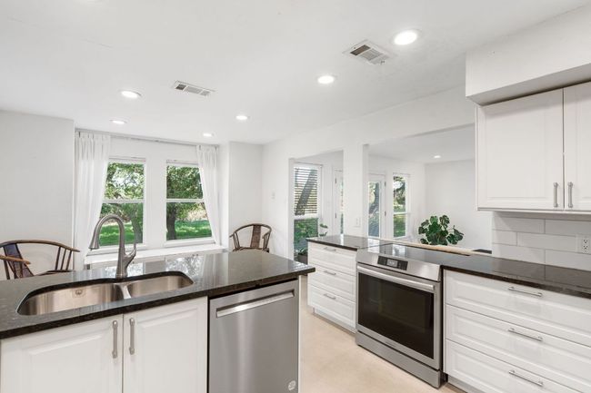 Kitchen with new SS appliances | Image 6