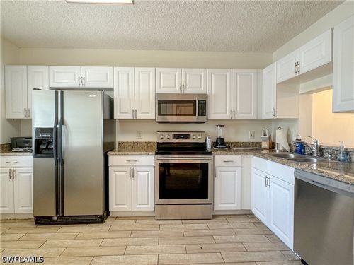 a-102-7794 Emerald Cir, NAPLES, FL, 34109-1784 | Card Image