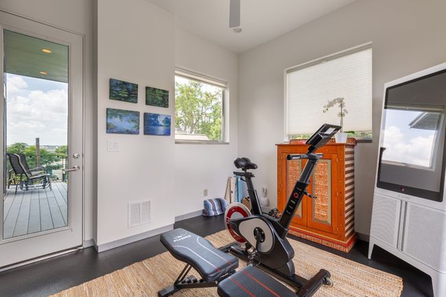 Two entrances to this room, with both a sliding double door to the private primary decks, or a standard full lite door leading to the second set of primary sliding doors! | Image 39