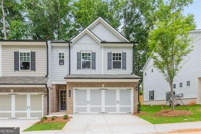 128 Town Walk Drive, Townhouse with 3 bedrooms, 2 bathrooms and null parking in Holly Springs GA | Image 1