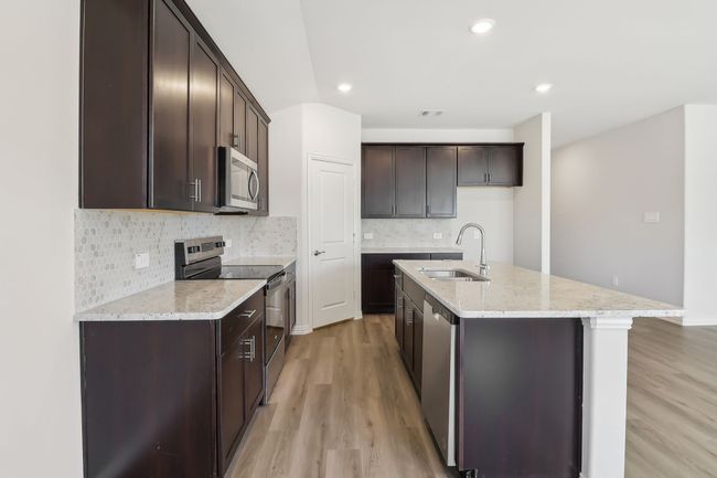 Photo is not of the actual home, but is an inspirational photo of builder’s model home and may depict options, furnishings, and/or decorator features that are not included. | Image 4