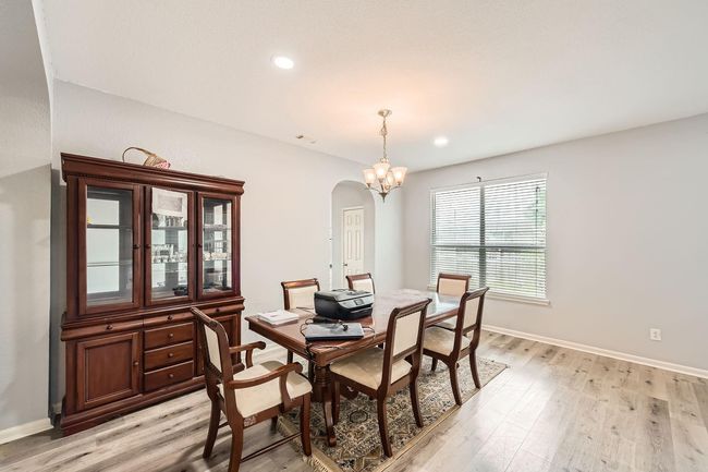 Welcoming formal dining room just off the front entrance. | Image 11