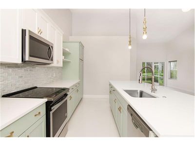 10605 Pelican Drive, Townhouse with 2 bedrooms, 2 bathrooms and null parking in Wellington FL | Image 3