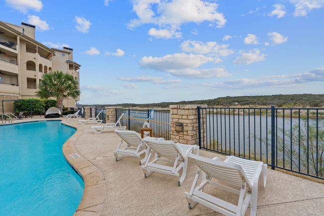 Lake shore living, 1 of 2 relaxing outdoor pool and jacuzzi areas on beautiful Lake Travis. Looking towards the sunset, West. | Image 21