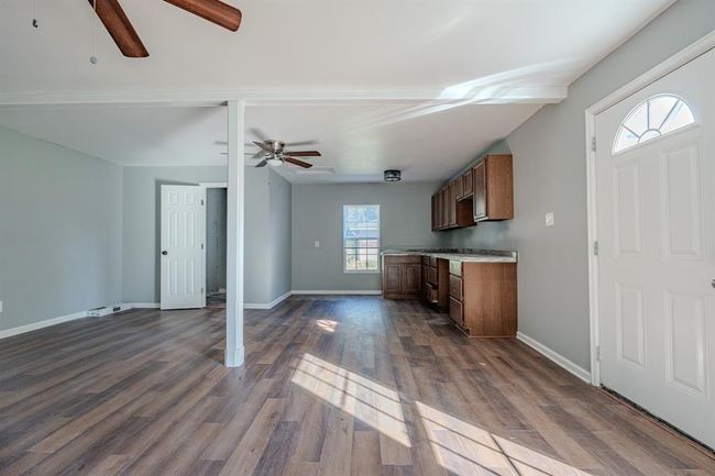 Garage apartment is well-suited for a cozy yet functional studio or one-bedroom setup, making it an ideal rental opportunity as well. | Image 24