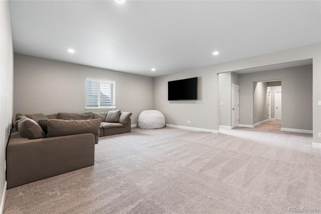 Full-size finished basement with 2nd kitchen area/wetbar complete with Samsung BeSpoke fridge and dishwasher, quartz countertops and plenty of cabinet storage. | Image 37