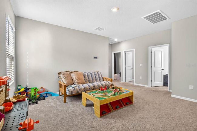 Travel upstairs to the loft-the perfect flex space for everyone. | Image 21