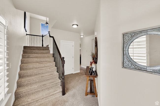 Stairs featuring carpet flooring | Image 4