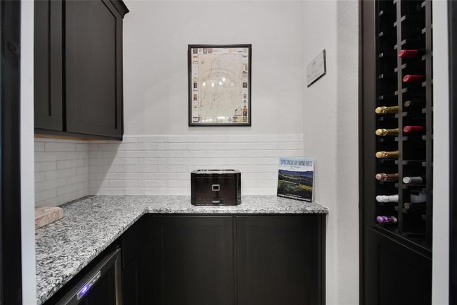 Custom built-in wine storage adds a touch of elegance and luxury. | Image 9