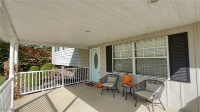 View of patio / terrace with a porch | Image 2