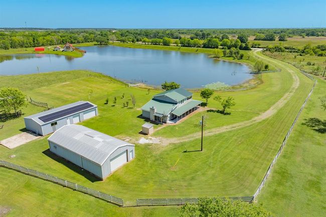 This Gorgeous Homesite has Two 1, 800 square foot Barns/Shops that are really incredible - and a sparkling Lake/Pond that seems to wash your cares away. | Image 5
