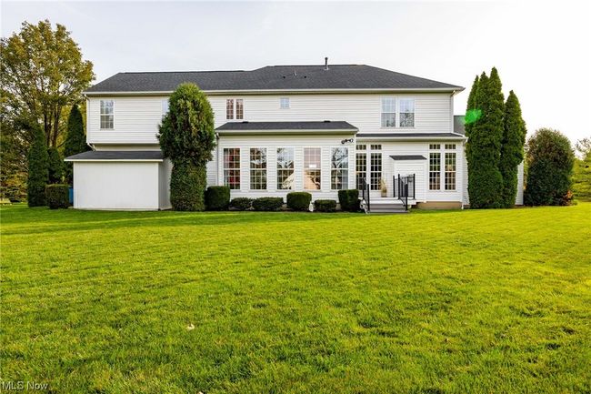 Back of property with a yard | Image 32