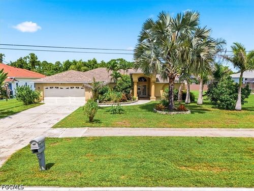 713 Milwaukee Blvd, LEHIGH ACRES, FL, 33974-9571 | Card Image