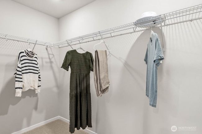 Primary walk-in closet. Pictures are for representation only. Colors and options will vary! | Image 17