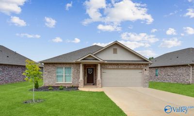 Charming four bedroom home features an open concept floor plan | Image 1