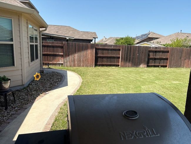 View of yard featuring fence | Image 38