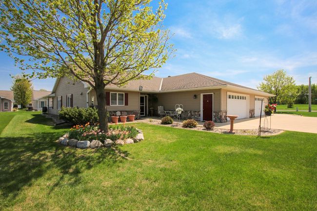 Enjoy the meticulously maintained landscaping in a fantastic location near parks and schools! | Image 15