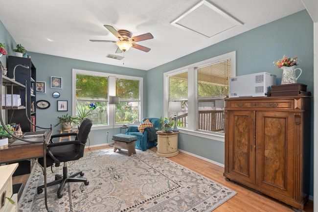 The den is a great space to work, play music, games, do crafts... whatever you desire. | Image 10