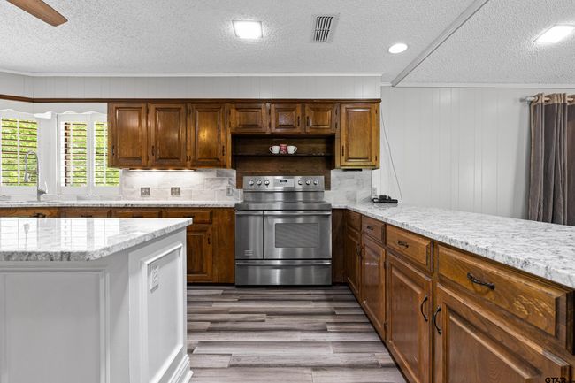 1821 Azalea St, House other with 4 bedrooms, 3 bathrooms and null parking in Gilmer TX | Image 4