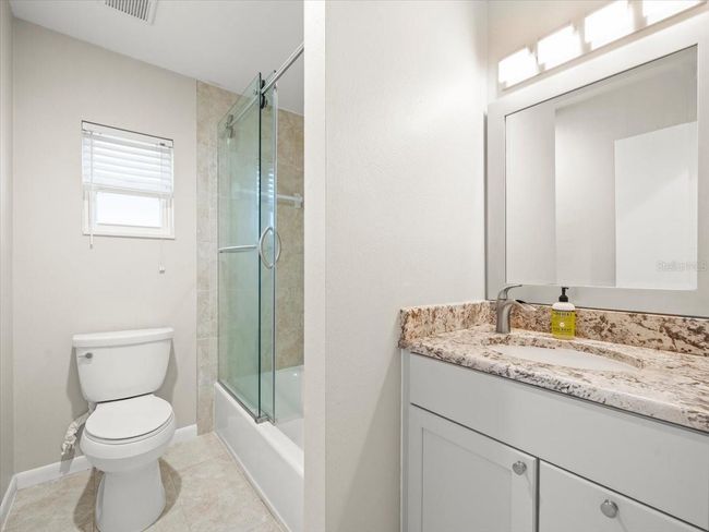 4016 Windtree Dr, House other with 4 bedrooms, 2 bathrooms and null parking in Tampa FL | Image 24
