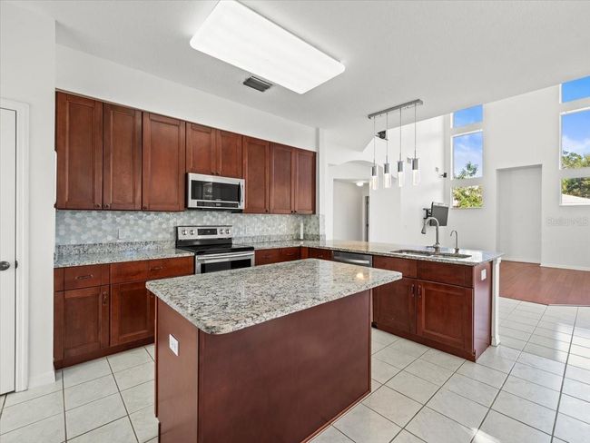 9701 Hidden Cove Ct, House other with 5 bedrooms, 3 bathrooms and null parking in Tampa FL | Image 17