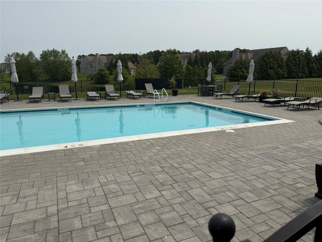 Community pool featuring a patio | Image 27