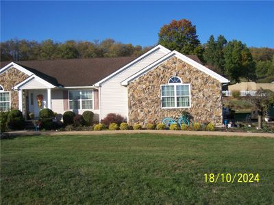 2024 Lexington Dr, House other with 4 bedrooms, 2 bathrooms and 2 parking in Dunbar Twp PA | Image 3