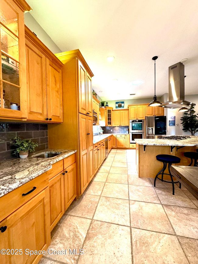 52 Riverview Ln, House other with 5 bedrooms, 3 bathrooms and null parking in Cocoa Beach FL | Image 22